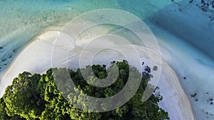 Aerial view of Amazing island with  white sand beach green tree forest and blue sea water background