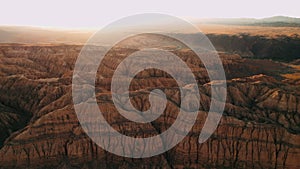 Aerial view of the amazing rocks on sunset, golden hour, cliffs, Canyon, Grand Canyon. sunrise aerial flight. Beautiful