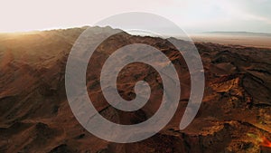 Aerial view of the amazing rocks on sunset, golden hour, cliffs, Canyon, Grand Canyon. sunrise aerial flight. Beautiful