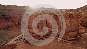 Aerial view of the amazing rocks on sunset, golden hour, cliffs, Canyon, Grand Canyon. sunrise aerial flight. Beautiful