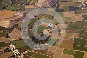 Aerial view of american countryside, farmland from the plane with green agriculture fields