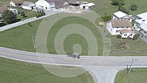 Aerial View of an Amish Horse and Buggy Trotting