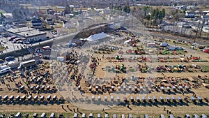 Aerial View of an Amish Mud Sale Selling Buggies, Quilts and Other Amish Crafts