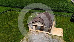 Aerial View of an Amish One Room School House, in the Middle of a Corn Field, With a Baseball Field