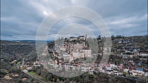 Aerial view of an ancient french village, sunset timelapse of Rocamadour and its castle on cliff