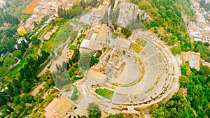 Aerial view of ancient Greek amphitheater in Taormina,Siciliy,Italy. Greek theatre aerial view, popular sight seeing destination