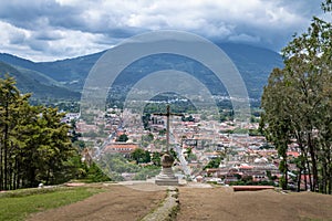 Aerial view of Antigua Guatemala city from Cerro de la Cruz with Agua Volcano in the background - Antigua, Guatemala photo