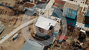 Aerial view of an apartment building with flat roof in construction, ballasted system with geotextile, PVC or EPDM membrane