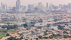 Aerial view of apartment houses and villas in Dubai city timelapse, United Arab Emirates