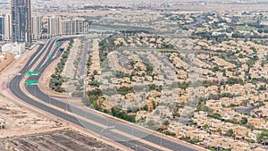 Aerial view of apartment houses and villas in Dubai city timelapse, United Arab Emirates