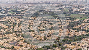 Aerial view of apartment houses and villas in Dubai city timelapse, United Arab Emirates