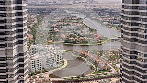 Aerial view of apartment houses and villas in Dubai city timelapse, United Arab Emirates