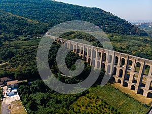 Aerial view. The Aqueduct of Vanvitelli, Caroline. Valle di Maddaloni, near Caserta Italy. 17th century. Large stone structure for