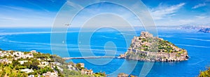 Aerial view of Aragonese Castle, most popular landmark and travel destination located in Tyrrhenian sea near Ischia island, Italy