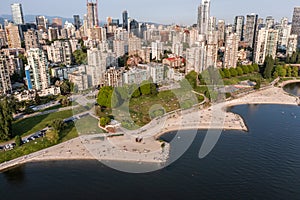 Aerial view of area around Sunset Beach Park at False Creek in Vancouver, Canada with people on the sunset beach