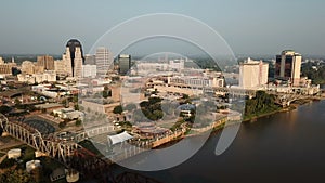 Aerial view ascending up over the Red River and Shreveport Louisiana