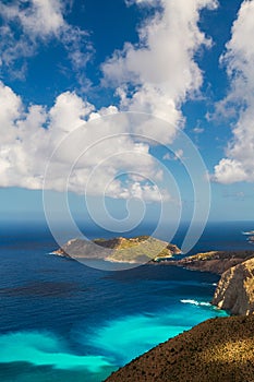 Aerial view at Asos village, Assos peninsula and fantastic turquoise and blue Ionian Sea water. Top view, summer scenery