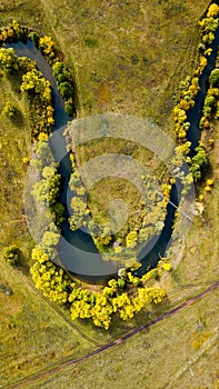 Aerial view of autumn smile shaped river