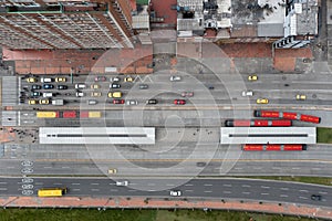 Avenue with a public bus station in the city of BototÃÂ¡. Colombia. photo