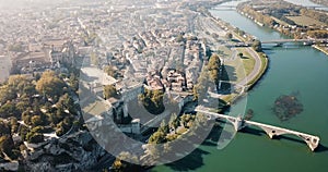 Aerial view of Avignon on bank of Rhone river with Palais des Papes in sunny autumn day, France