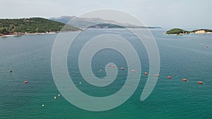 Aerial View Azure Beach with Empty Sun Loungers, Balkan Coast Ionian Sea Albania