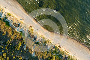 Aerial view of the Baltic Sea shore line near Klaipeda city, Lithuania. Beautiful sea coast on summer day