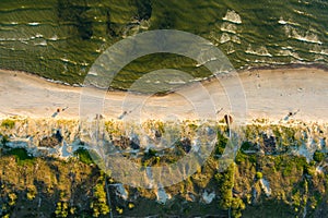 Aerial view of the Baltic Sea shore line near Klaipeda city, Lithuania. Beautiful sea coast on summer day