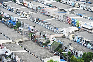 Aerial view of Bangkok City figuring poor houses in slums like district,heavily population and crowded,congested house in big city photo