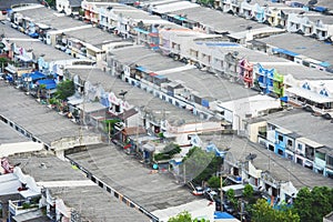 Aerial view of Bangkok City figuring poor houses in slums like district,heavily population and crowded,congested house in big city