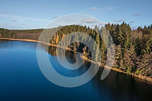 Aerial view on bank lake Bolduk in the autumn sunny morning