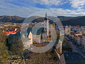 Aerial view of Banska Bystrica city center with town castle during winter