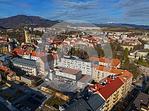 Aerial view of Banska Bystrica city center during winter with Prasiva mountain on horizont