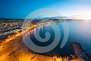 Aerial view of Barcelona Beach in summer night along seaside in