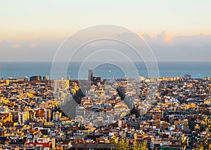 Aerial view of Barcelona city and mediterranean sea from Park Guell in sunset. Spain. November 2010