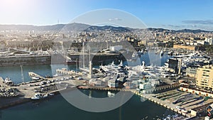 Aerial view of Barcelona city with port in sunny day