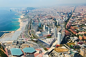 Aerial view of Barcelona with coastline from helicopter