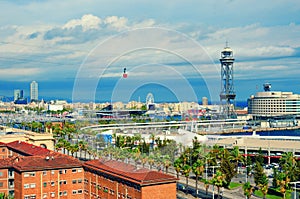 Aerial view of Barcelona. La Barceloneta, Port Vell, sea and red cabin of the cableway. Catalonia, Spain photo