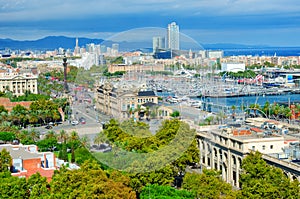 Aerial view of Barcelona. Passeig de Colom avenue and Columbus monument, La Barceloneta and Port Vell. Catalonia, Spain photo