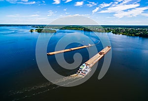 Aerial view of Barge or offshore vessel with cargo on the river