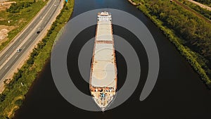 Aerial view:Barge on the river.