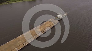 Aerial view:Barge on the river.