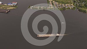 Aerial view: Barge on the river.