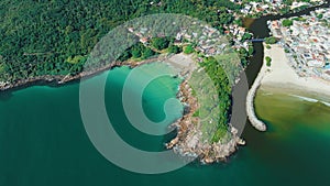 Aerial view of Barra da lagoa with river canal and ocean beach in Florianopolis