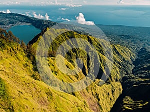 Aerial view of Batur caldera and lake with forest in Bali