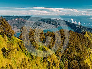 Aerial view of Batur volcano and lake with forest, Bali