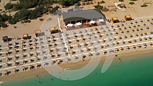 Aerial view of a beach in Blue Lagoon, Oludeniz Turkey. Mediterranean sea and public beach with parasols