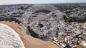 Aerial view of the beach, cliffs and white architecture of Albufeira, Portugal