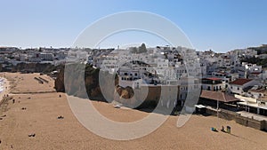 Aerial view of the beach, cliffs and white architecture of Albufeira, Portugal