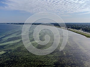 an aerial view of the beach and coast with clear water: Sweden, Ales stenar