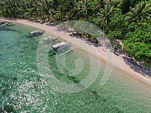 Aerial view of the beach with fishing boats. Elnido, Philippines, 2018